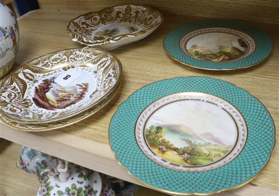 A pair of early 19th century landscape plates, a pair of similar Derby plates and a Derby shaped dish,